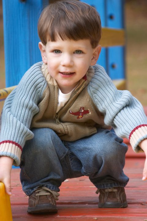 J.D. squatting at the park